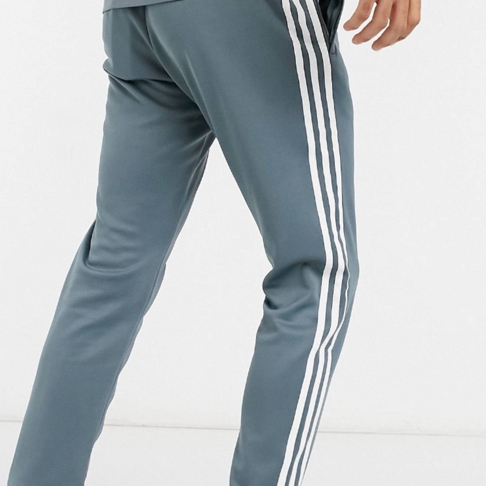 Adidas three stripes blue track pants women’s US size Medium